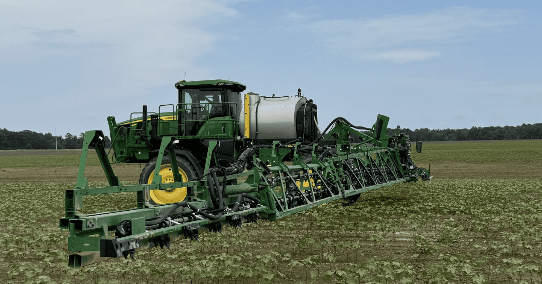 Herbicide sprayer in field