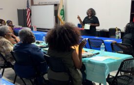 person speaking to an audience