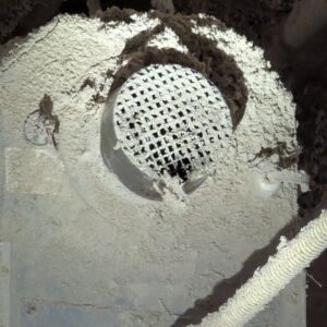 Figure 4. The air intake screen on this tube heater was clogged with caked dust and moisture.