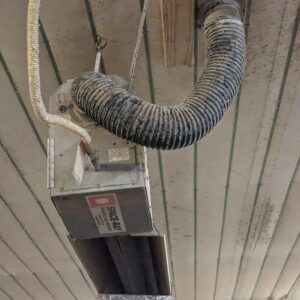 Figure 5. The air intake duct on this heater demonstrates how the duct length should allow a slight sag to trap condensation in the duct, reducing the moisture entering the heater burner box.