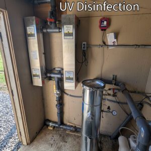 A picture showing the bag filtration and UV disinfection systems used for rainwater on a poultry farm.
