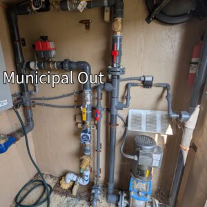 A picture showing the rainwater out and municipal water out control valves inside a control room on a poultry farm.