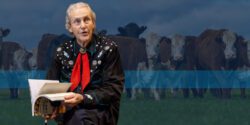 An image of Temple Grandin overlapping a blue background and image of hereford cattle.